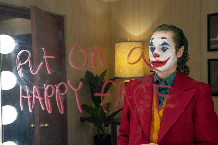 Joaquin Phoenix como Coringa
