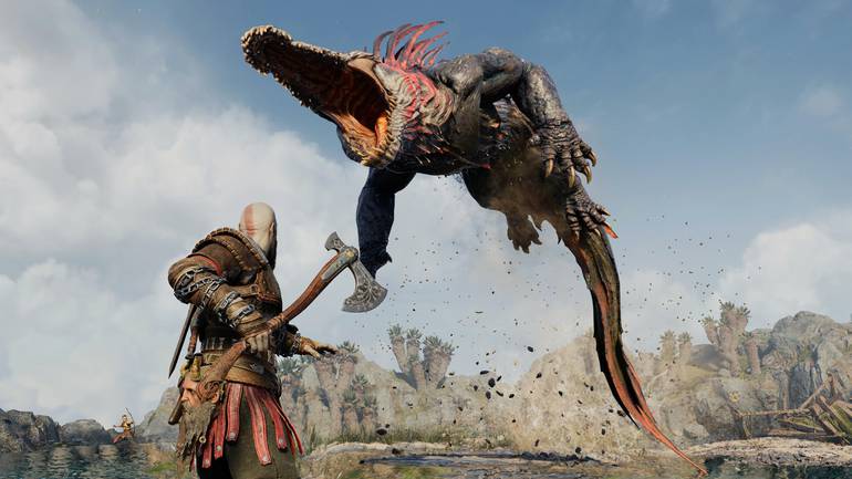 Kratos enfrenta monstro gigante.