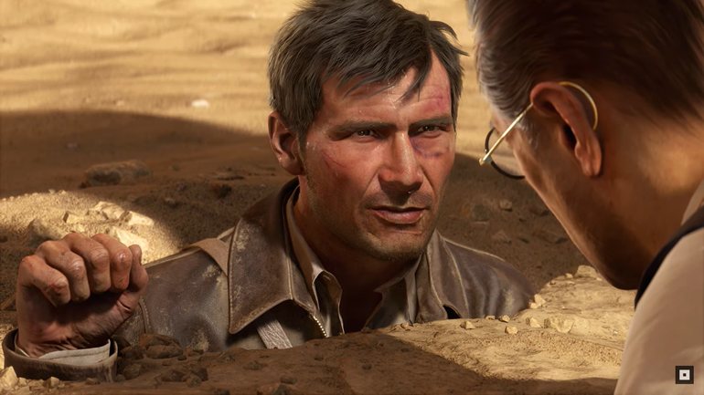 Indiana Jones preso na areia.