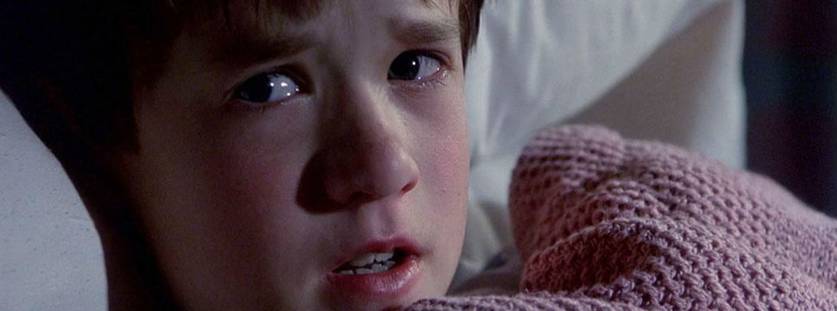 Haley Joel Osment em O Sexto Sentido