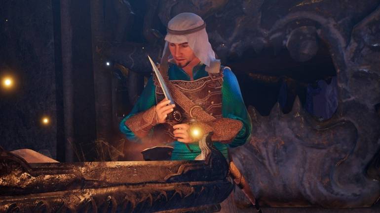 Imagem do primeiro trailer divulgado do remake de Prince of Persia the Sands of Time, com o protagonista contemplando sua adaga.