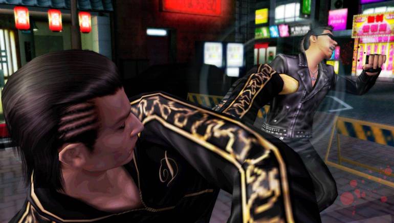 Personagem de Yakuza chuta inimigo.