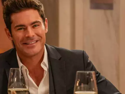 Zac Efron em cena de Tudo em Família (Reprodução)