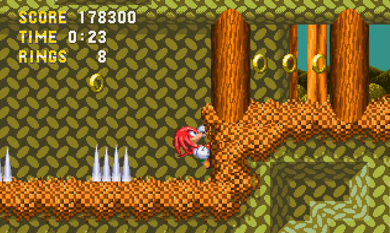 Knuckles escalando.