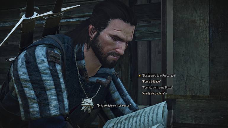 Geralt lendo com cabelo preto.