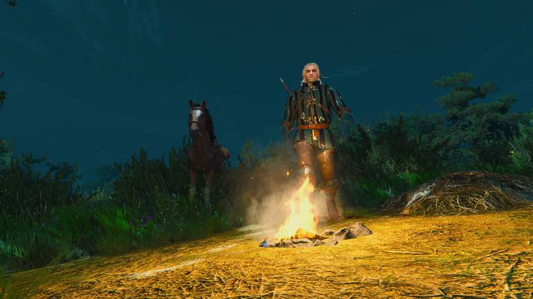 Geralt na fogueira.